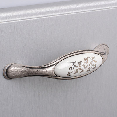 Buton mobilier Tulip Margarita – cositor antichizat (old tin) / porțelan alb cu motiv floral, rotund, Ø35 mm, H27 mm