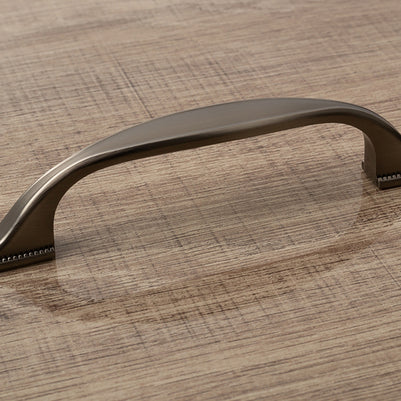 Buton mobilier Tulip Tomo – cositor antichizat (old tin), oval, 38 × 19 mm, cu șurub