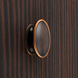 Buton mobilier Tulip Tomo – cupru antichizat închis (old copper dark), oval, 38 × 19 mm, cu șurub
