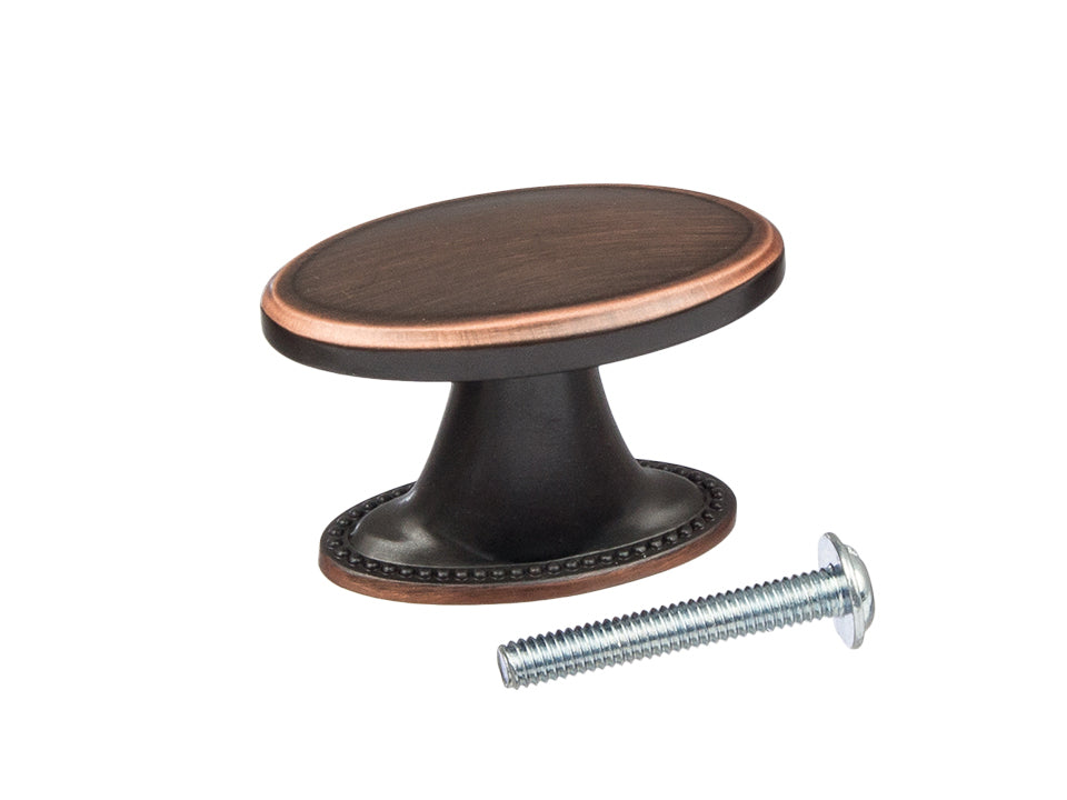 Buton mobilier Tulip Tomo – cupru antichizat închis (old copper dark), oval, 38 × 19 mm, cu șurub
